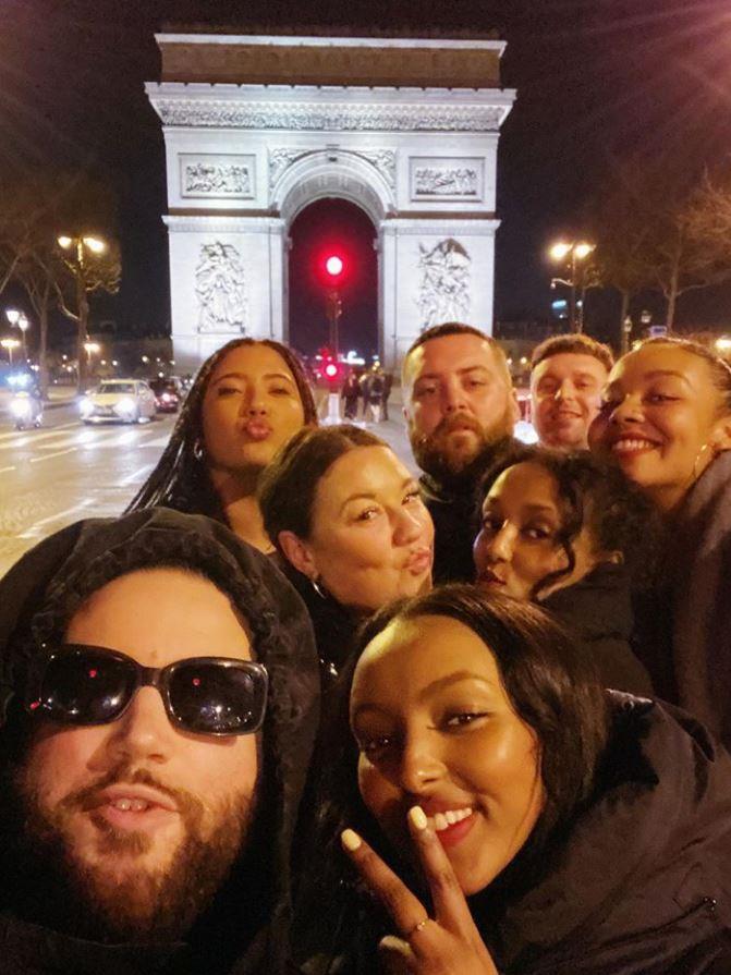 Triumphant: Calver with her mates at the Arc de Triomphe