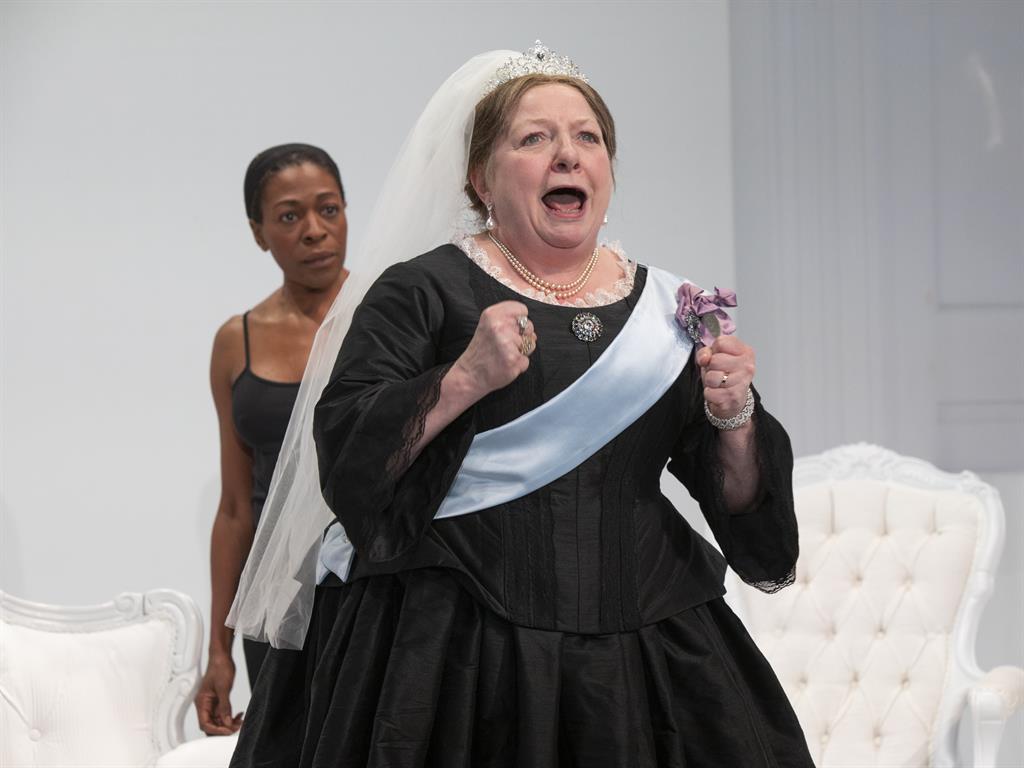 Regal aid: Harriet Walker as the queen
