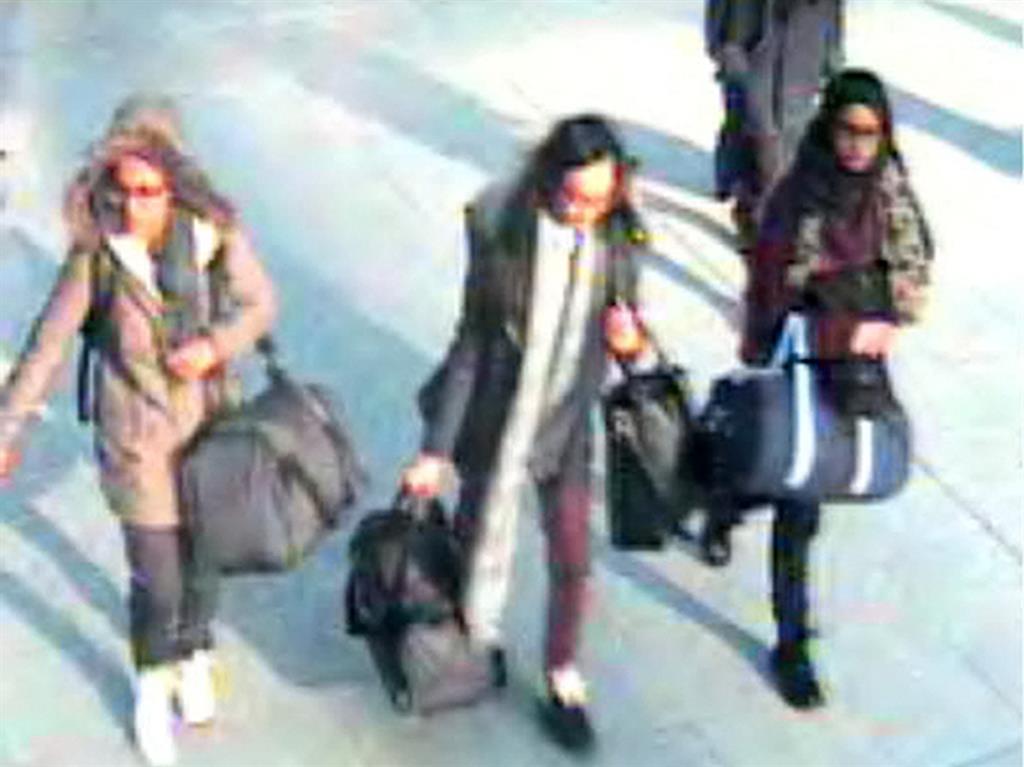 Flight: Schoolgirls Amira Abase, Kadiza Sultana and Shamima Begum captured on CCTV leaving the UK for Syria in February 2015 PICTURES: PA/REX