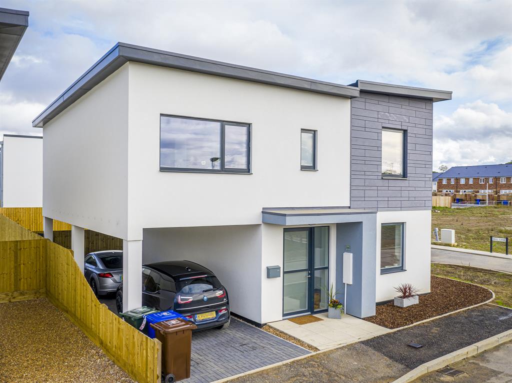 Custom build: Purchasers can choose layout and materials for their eco-homes amid vast green space, below