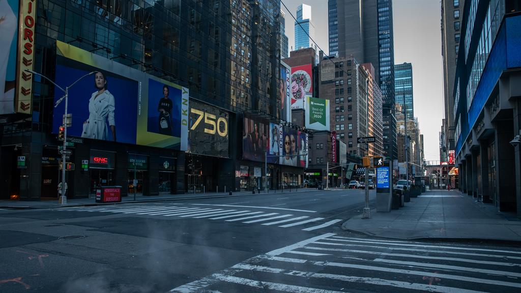 So quiet: Times Square is deserted as New York virus cases continue to rise PICTURE: SWNS
