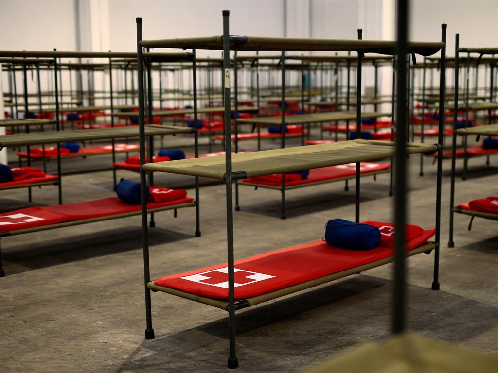 Bunk down: Beds are ready at the makeshift hospital in Barcelona PICTURES: GETTY