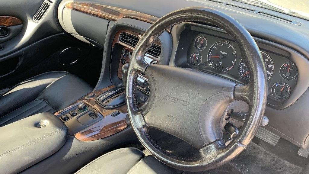 Flash motor: Inside the Aston Martin DB7 Vantage with custom gold paint and black leather interior PICTURES: PA