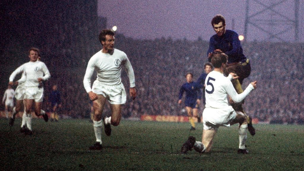 Crunch: Charlton gets stuck into Osgood in the Old Trafford replay PICTURE: GETTY