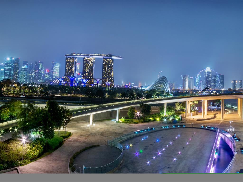Howzat for a skyline? Singapore’s cricket wicket-like Marina Bay Sands hotel viewed from Marina Barrage and, below, satay