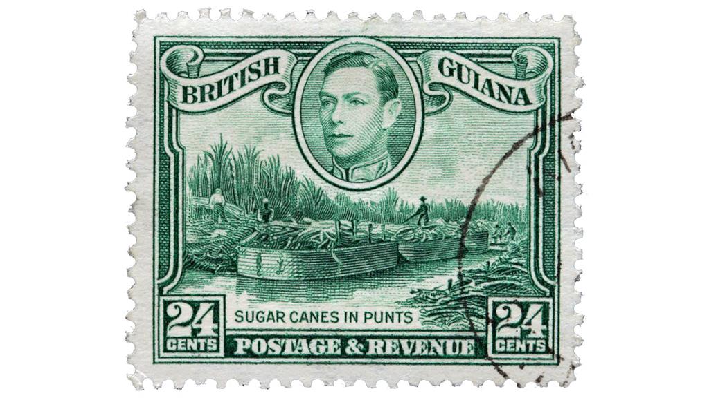 Sweet and sticky: Stamp printed by British Guyana showing sugar cane being transported in punts, around 1938 PICTURE: SERGEY GORYACHEV VIA SHUTTERSTOCK