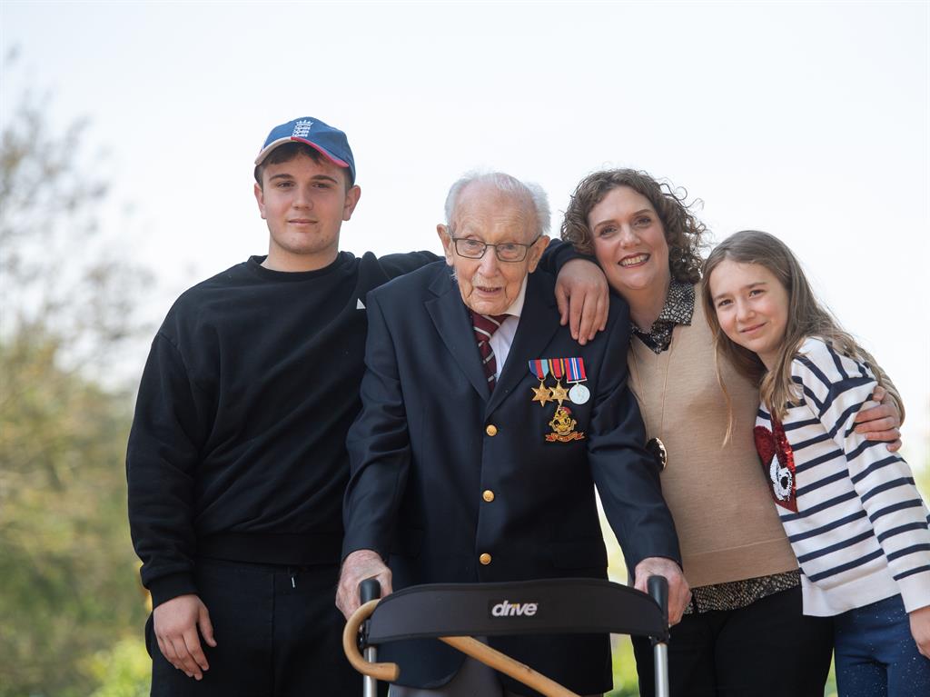 'Bubble of joy': Tom with (left to right) grandson Benji, daughter Hannah Ingram-Moore and granddaughter Georgia at his home in Marston Moretaine, Bedfordshire PICTURE: PA