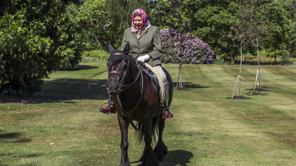 Queen Elizabeth photographed riding a horse at Windsor Castle