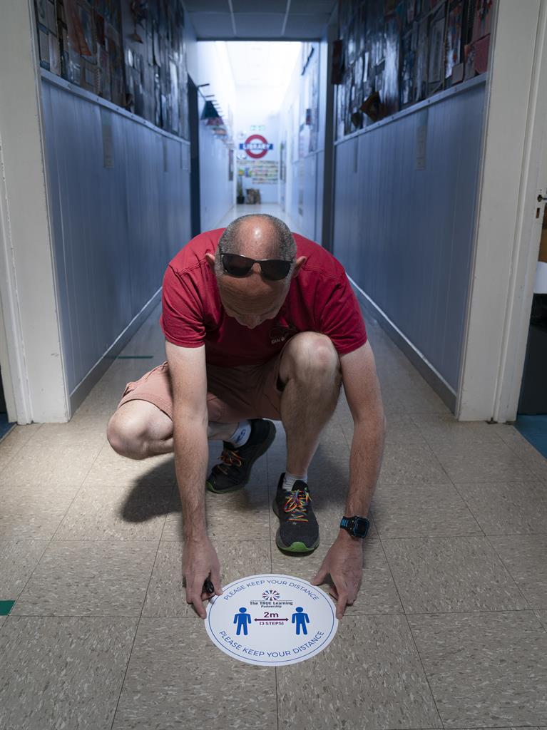 Floor marking: Headteacher David Waugh at Poynton High School in Cheshire PICTURE: REX