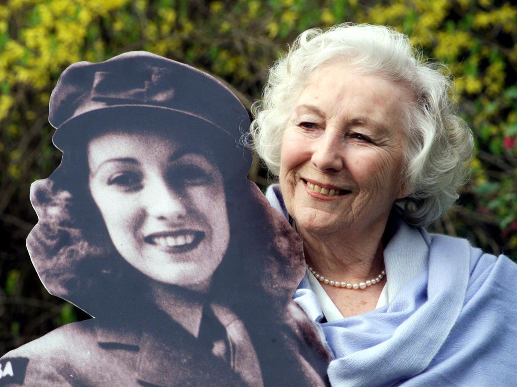 Looking back: Dame Vera with a cut-out of herself during the war