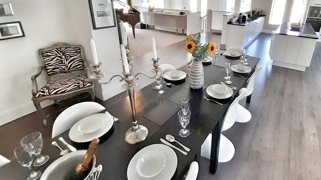 Eat your heart out: The dining table and chic open-plan kitchen