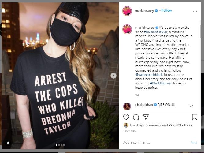 Message: A protester sports same T-shirt as Hamilton calling for action over shooting in Louisville