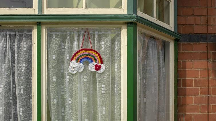 Dressing: A crocheted rainbow hangs in a window PICTURE: ANDREW ROBINSON