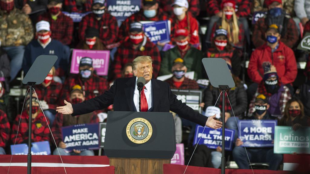 Trump thrives on rallies but won’t be able to attend them for at least a couple of weeks PICTURE: AAP/AP/JACK RENDULICH