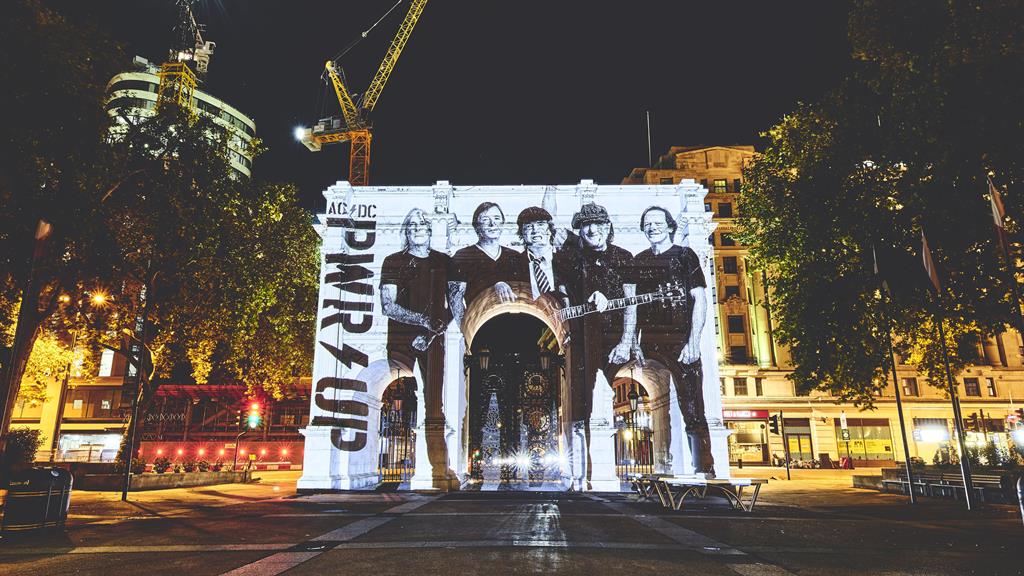 Powered up: The band projected imagery onto London landmarks including Marble Arch (above) and the Tate Modern (below) to launch the new single