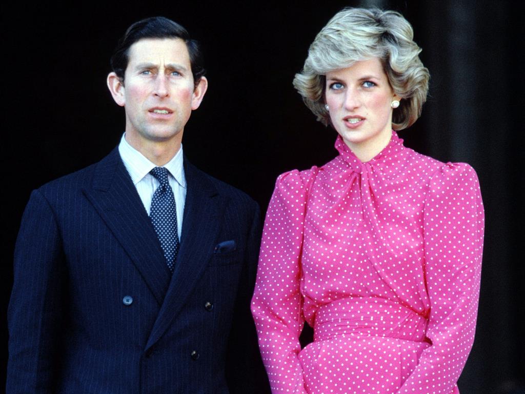 Sad story: Spencer focuses on Diana deciding to end her marriage to Prince Charles, both pictured here in 1985
