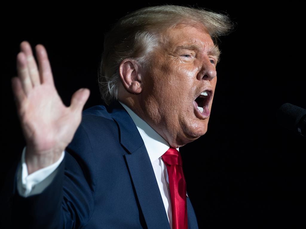 Rallying call: Trump at a campaign rally in Sanford, Florida. yesterday PICTURE: AFP
