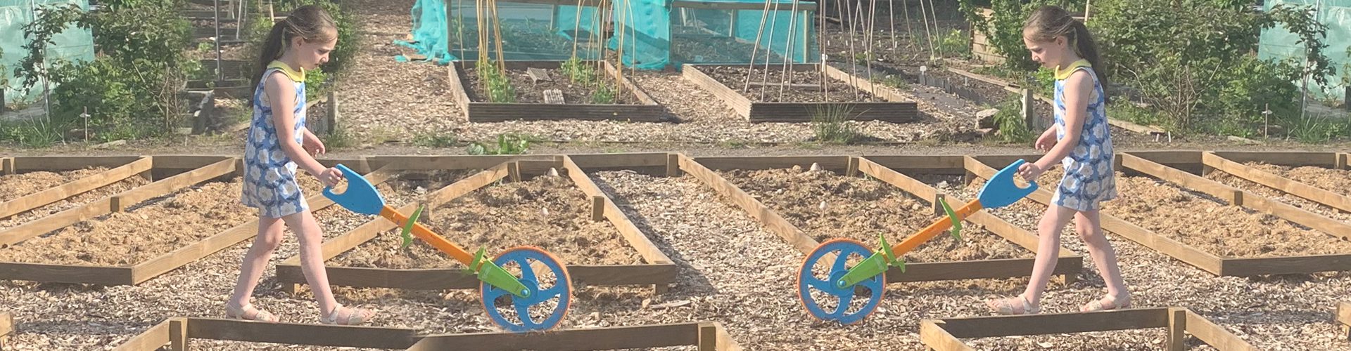 measure mate review banner showing a girl using the trundle wheel in an allotment