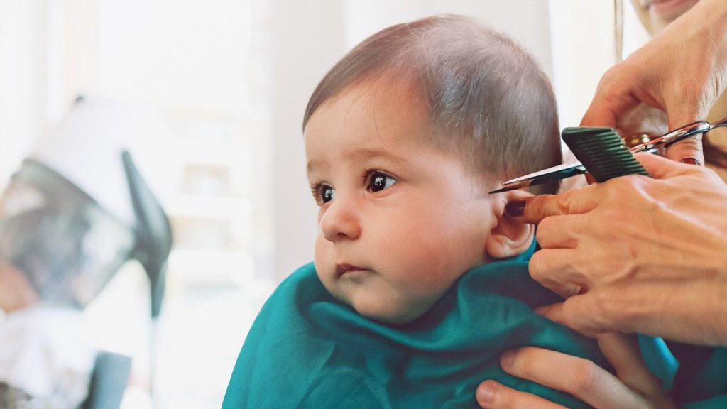 baby having a haircut -how to keep your child still during a haircut