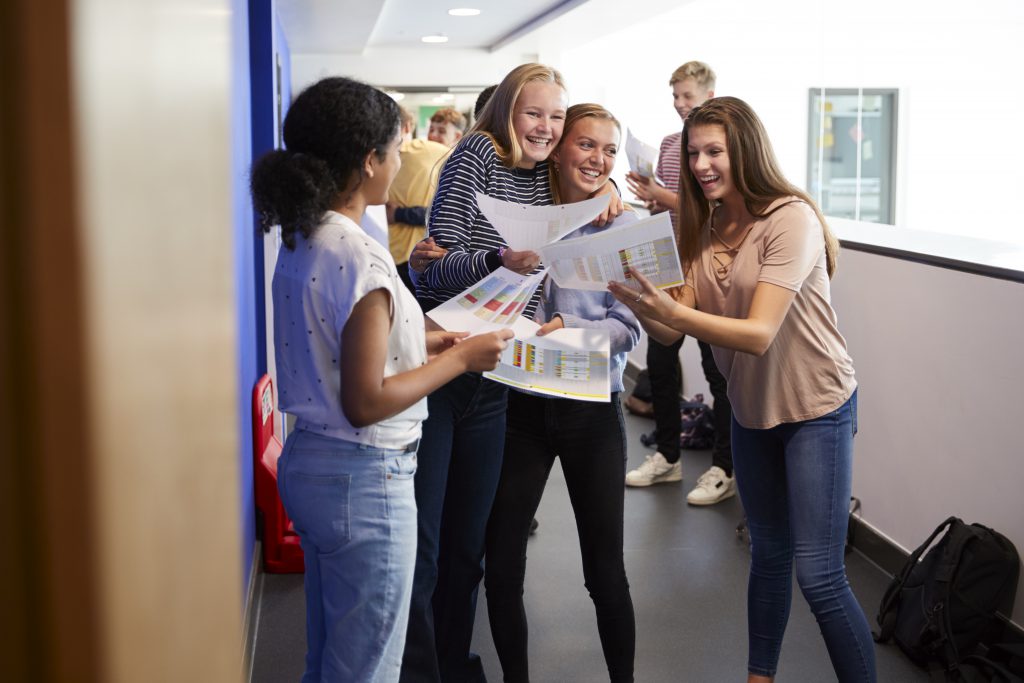 students collecting GCSE's - New GCSE Grades Explained