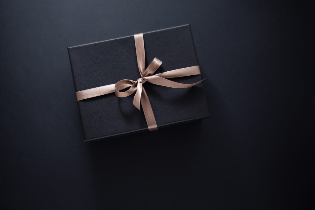 gift wrapped in dark paper - make someone special happy