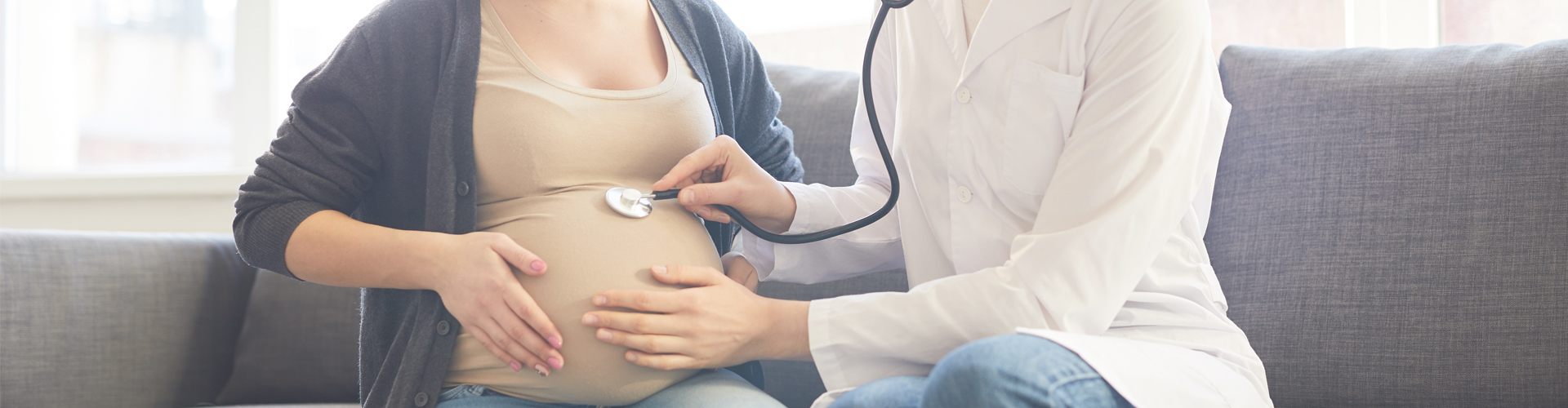pregnancy - Gynaecologist examining mum to be