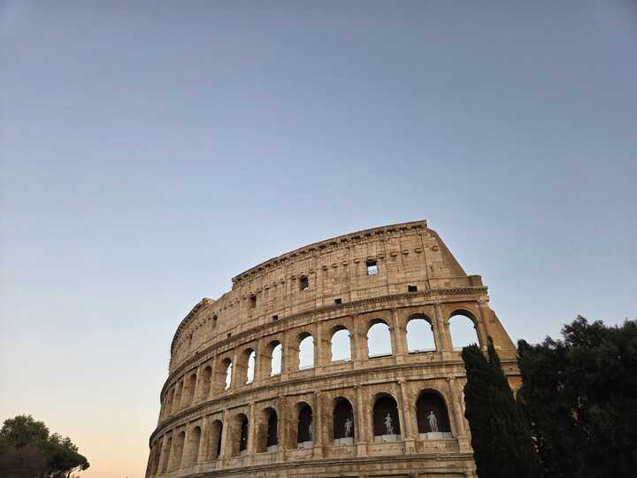 An image of the colosseum at sunset.