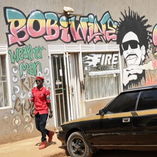 Ugandan pop star vows to fight on after arriving from US