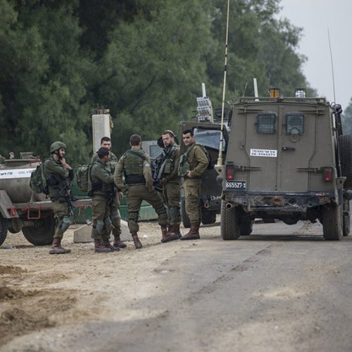 Palestinians launch dozens of rockets into Israel after raid
