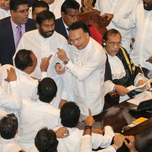 Punch-up in Sri Lankan parliament as thousands rally