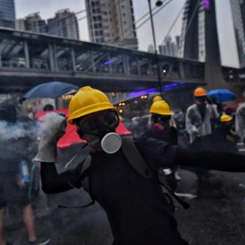 Hong Kong police shoot man in day of violence and chaos