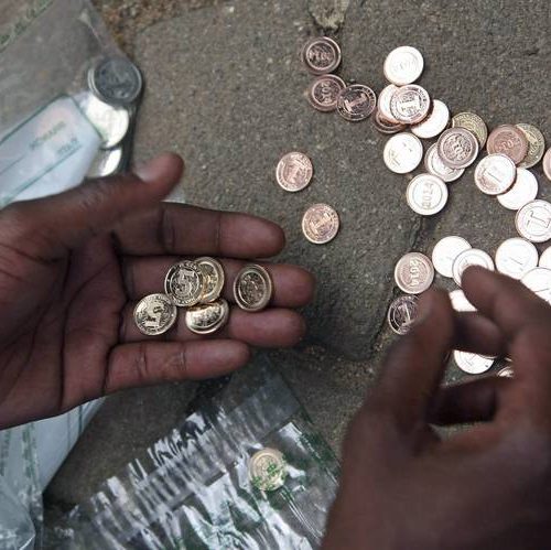 New money: Bank account holders given heaps of coins
