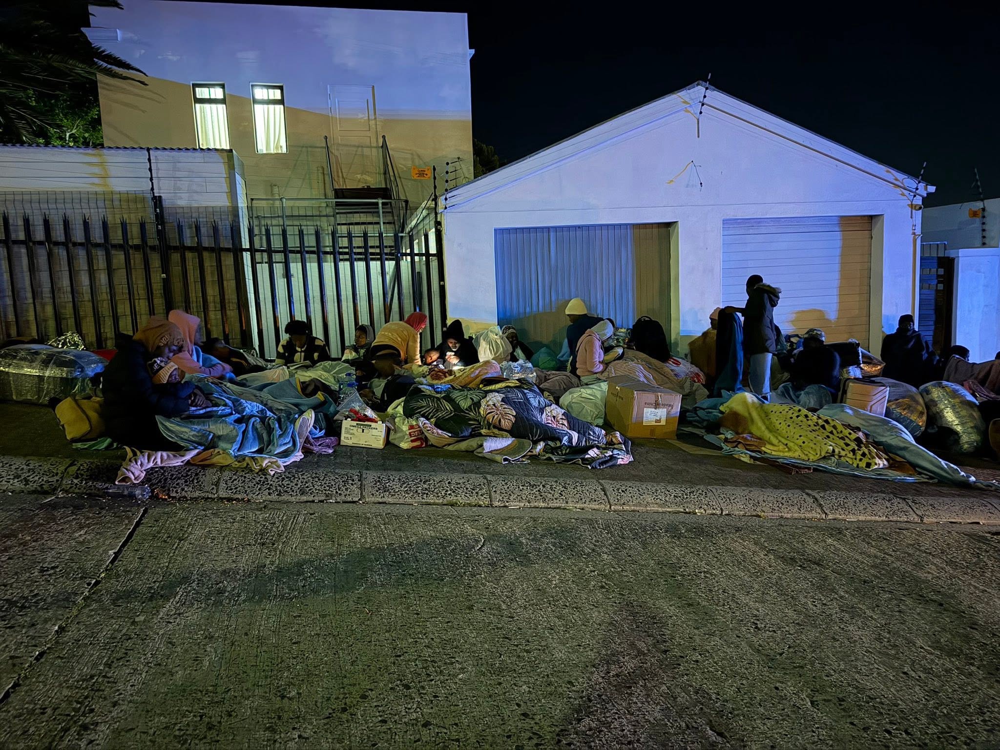 Hundreds of Zimbabweans camp outside consulate in Cape Town