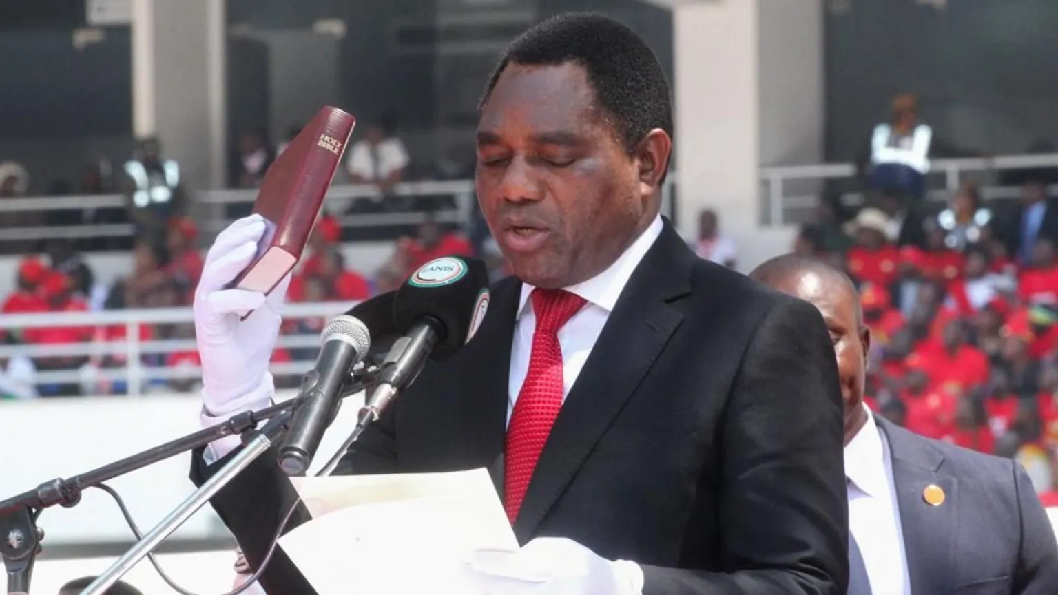 Zambia’s president sworn in for second term while opponent detained