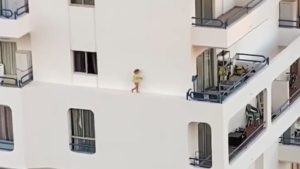 Toddler climbs out of 5th floor Tenerife apartment window in shocking video