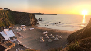This beach has been transformed into a private glamping retreat with jet-skis and Champagne