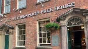 Wetherspoons to cut drink prices next month with beers from 99p