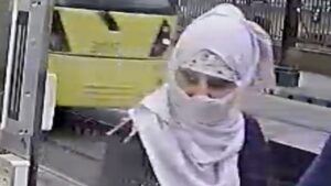 GMP want to speak to this woman after an elderly couple had money stolen in the city centre