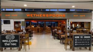 Wetherspoons to sell pubs as it records £30m in losses