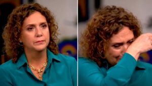 Captain Tom’s daughter admits keeping £800,000 as she breaks down in tears