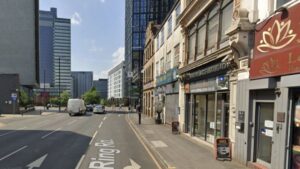 Two arrested after double stabbing in Manchester city centre