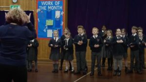 Primary school children learning sign language as part of curriculum