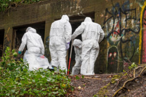 Two men charged with murder after torso discovered in Salford nature reserve