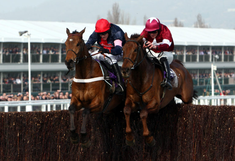 Barry Geraghty and Bobs Worth (left) winning the RSA Chase from Davy Russell and First Lieutenant