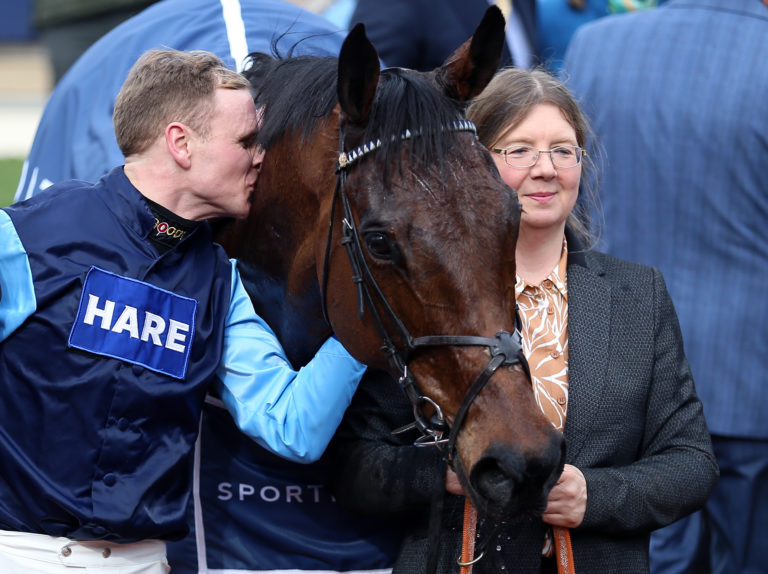 Tom Cannon gives Edwardstone a kiss after winning the Arkle last season