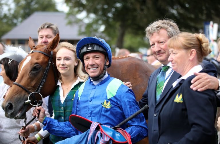 Frankie Dettori with Mark Johnston after riding Poet's Society to a record-breaking victory at York