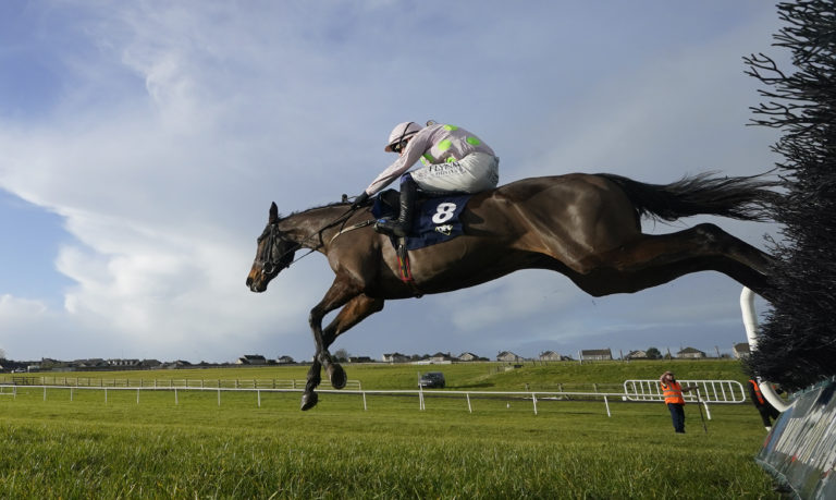 Quais De Paris ridden by Paul Townend jumps the last to win The David Flynn Construction Maiden Hurdle during Savills New Years Chase Day at Waterford and Tramore Racecourse
