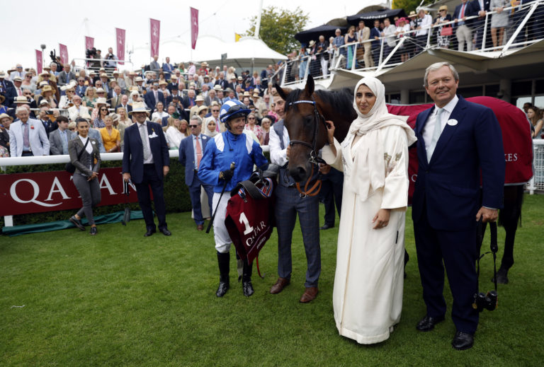 Jockey Jim Crowley (left), with Sheikha Hissa Hamdan Al Maktoum and trainer William Haggas following his winning ride on Baaeed in the Qatar Sussex Stakes at Glorious Goodwood