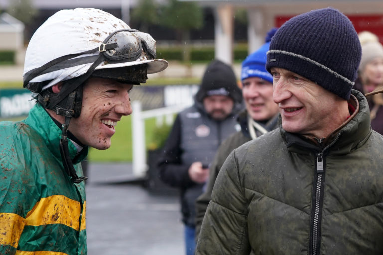 Brian Hayes and trainer Colm Murphy celebate after winning the Madigan Group Novice Chase with Impervious at Punchestown Racecourse