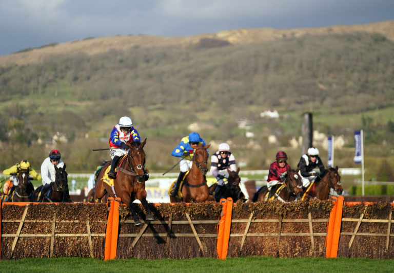 Love Envoi ridden by Jonathan Burke clears a fence before going on to win the Ryanair Mares' Novices' Hurdle during day three of the Cheltenham Festival in 2022